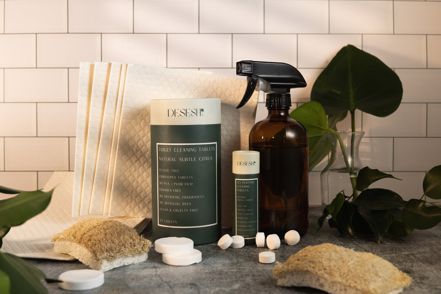 This image shows a plant fiber and cellulose dish sponge as a plastic free dish sponge alternative for a more sustainable eco friendly dishwashing and cleaning routine. Also shown are other cleaning products that Desesh offers