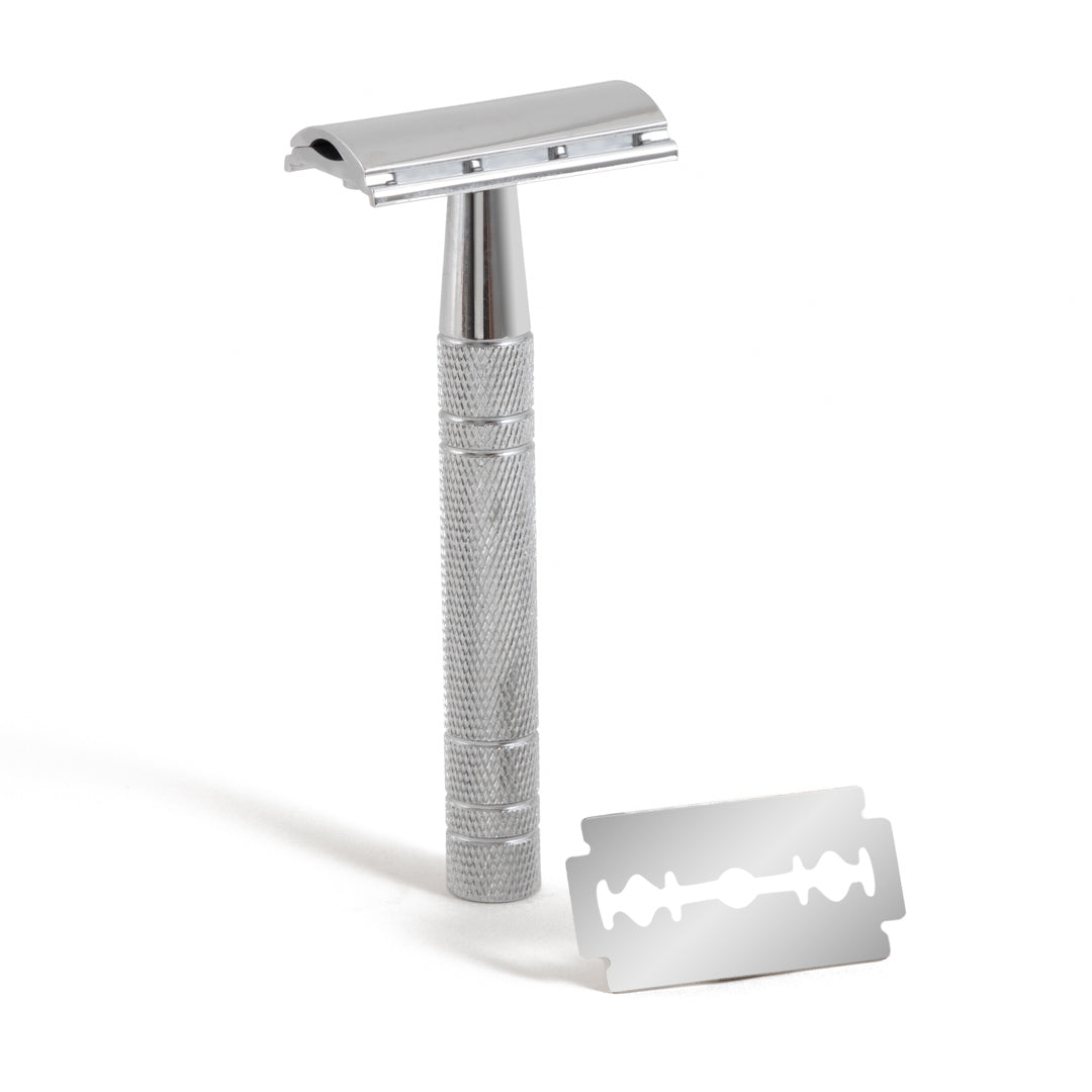 This image shows a metal reusable safety razor for body and face shaving as a plastic free alternative to disposable razors. It comes with replacement blades. It is designed for eco friendly zero waste plastic free more sustainable shaving.