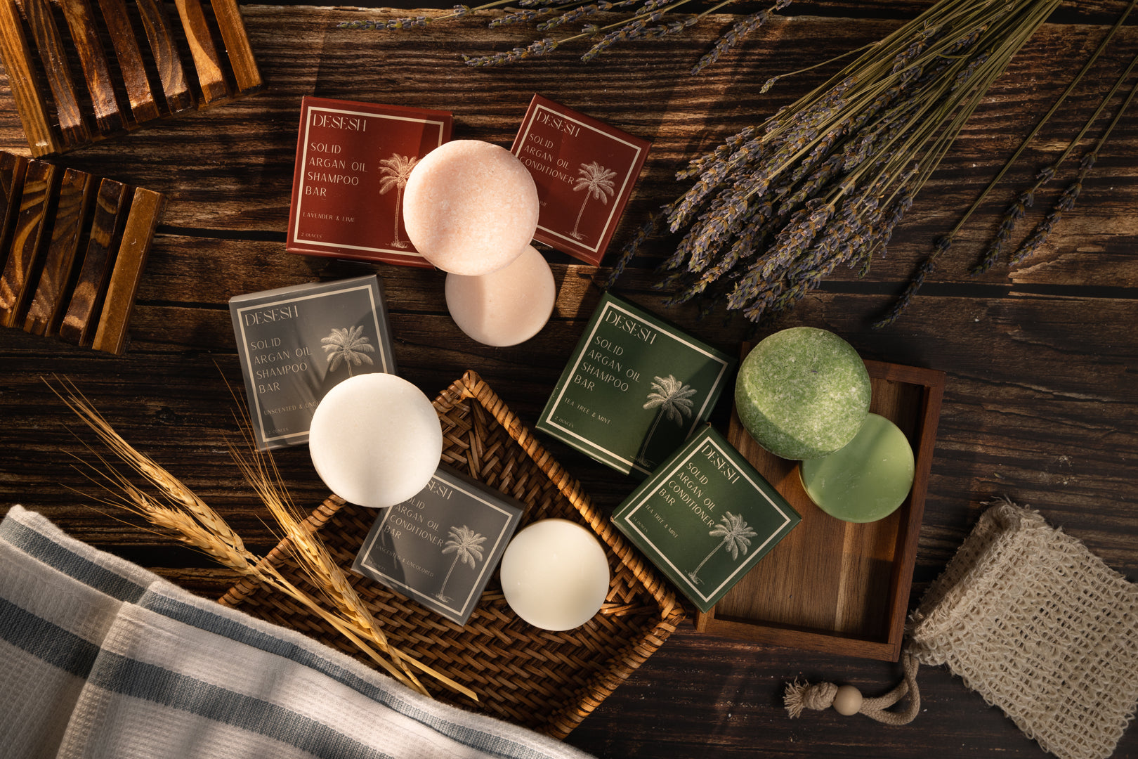This image shows salon quality Argan Oil Shampoo bars with plastic free biodegradable packaging for a more sustainable eco friendly zero waste hair care routine. This image shows all three of the Argan oil  solid shampoo and conditioner bars