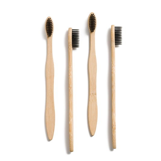 This image shows the Desesh 4-pack of bamboo manual toothbrushes for a more sustainable eco friendly plastic free dental and oral care routine