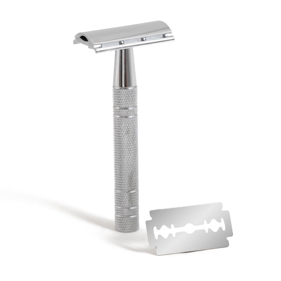 This image shows a metal reusable safety razor for body and face shaving as a plastic free alternative to disposable razors. It comes with replacement blades. It is designed for eco friendly zero waste plastic free more sustainable shaving. 