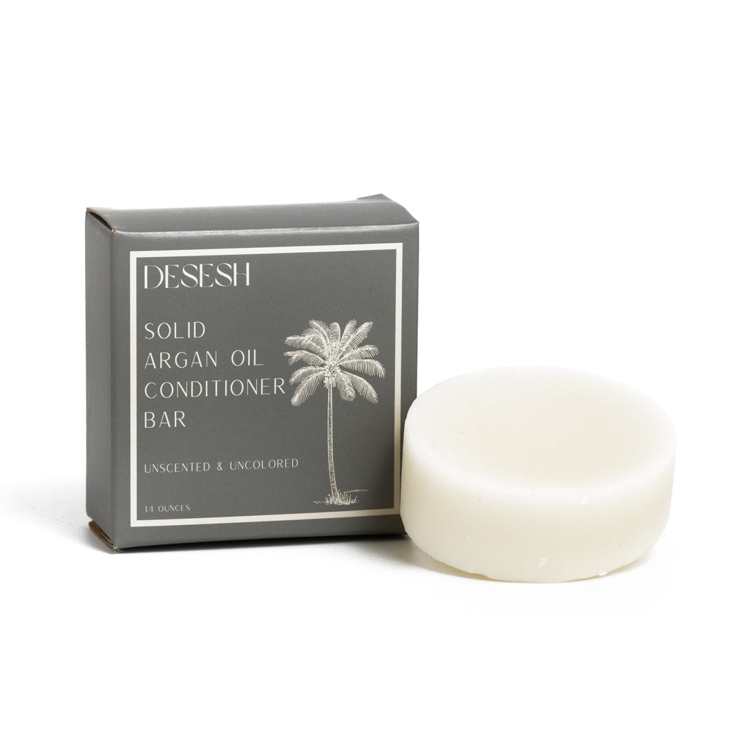 This image shows salon quality Argan Oil solid conditioner bars with plastic free biodegradable packaging for a more sustainable eco friendly zero waste hair care routine. Shown here is the unscented and uncolored solid conditioner bar