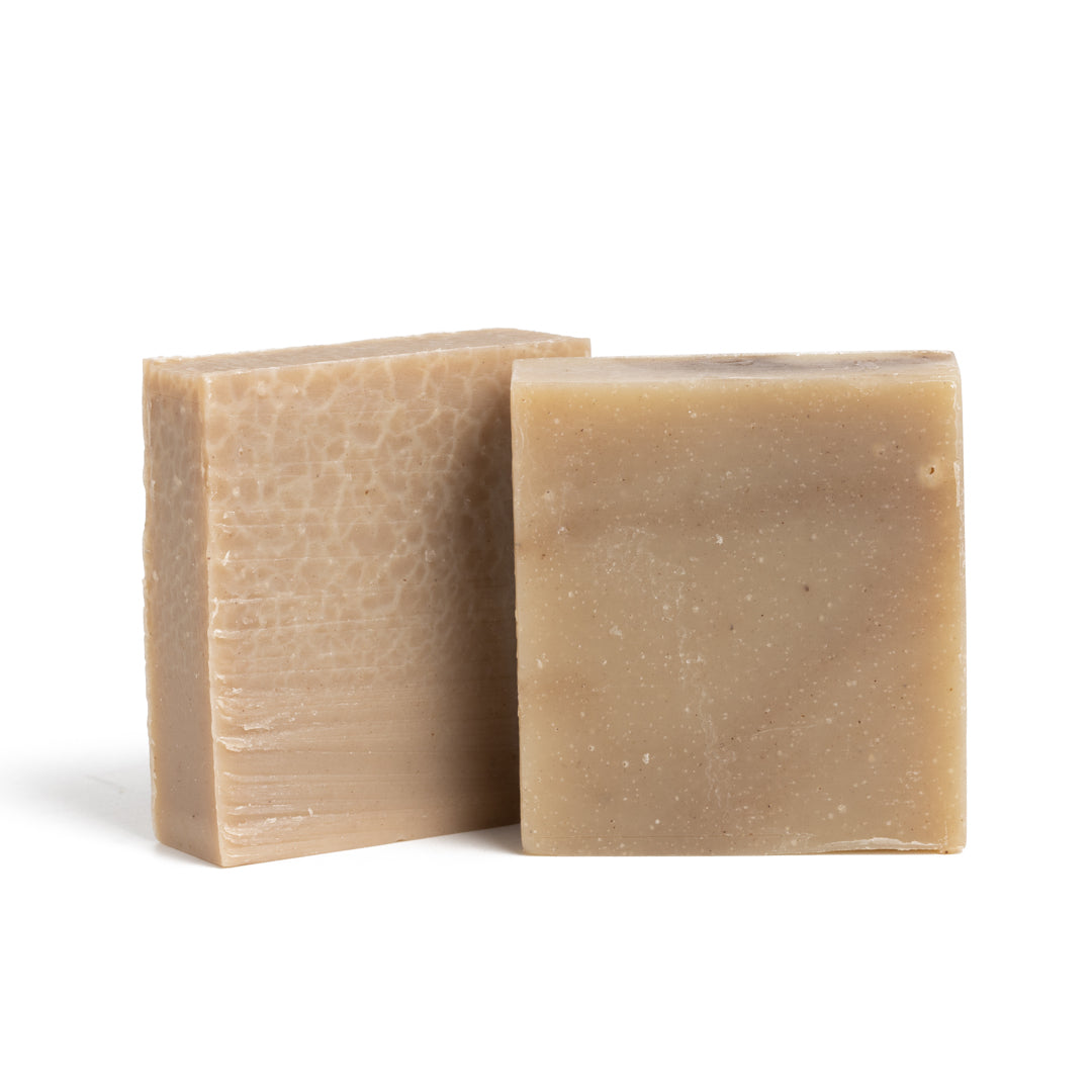 This image shows the Desesh premium quality solid body and face shave soap bar as an alternative to cans of shave foam or cream. This is a more eco friendly sustainable zero waste option and the shave bars come in biodegradable packaging. Shown here are the two shave soap bar options