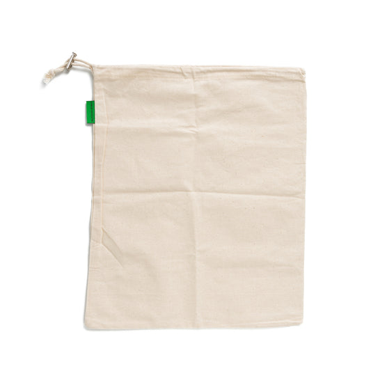 This image shows the Desesh solid cotton reusable grocery produce bag with tare weight label for plastic free zero waste more sustainable eco friendly shopping as an alternative to plastic bags