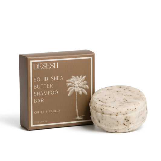 This image shows salon quality Shea Butter solid shampoo bars with plastic free biodegradable packaging for a more sustainable eco friendly zero waste hair care routine. Shown here is the coffee and vanilla solid shampoo bar which has natural scents and colors